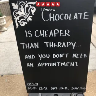 a sign that says chocolate is cheaper than therapy and you don&apos;t need an appointment