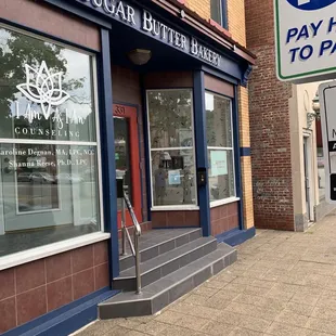 the entrance to sugar butter bakery