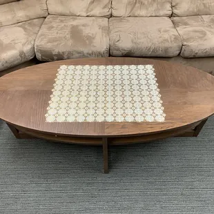 a coffee table on a carpeted floor