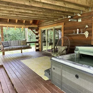 Relaxing back porch with hot tub