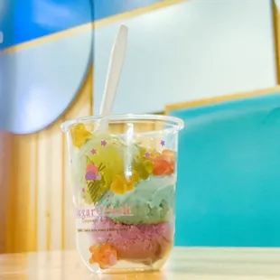 Green tea, Cookie Monster, and Ube ice cream with gummie bears.