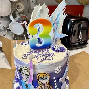 Frozen and Mermaid themed cake.