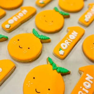 orange cookies with name tags