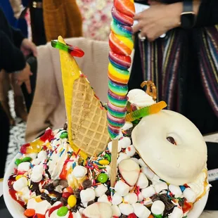 ice cream sundae with sprinkles and candy