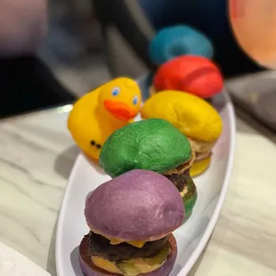 Rainbow sliders, comes with a cute rubber ducky!