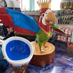 The Sugar Kingdom mascot - a macaw parrot.