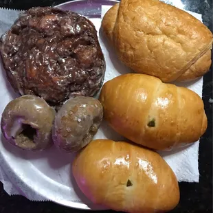 Apple fritter (still warm!), glazed blueberry cake donuts, jalepeno boudin kolaches, croissant sausage n cheese kolache