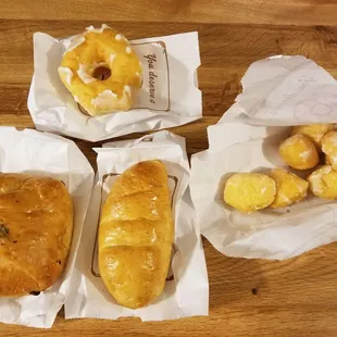 Potato, egg, &amp; cheese kolache (left), boudin kolache (middle), donut holes, &amp; glazed donut