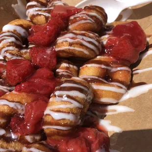 Large with strawberries, vanilla sauce and chocolate sauce