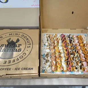 two boxes of doughnuts