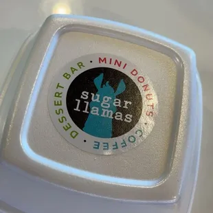 a close up of a container of sugar llamas