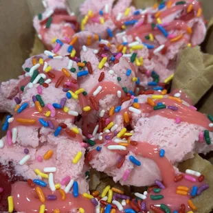 Ice cream nachos! Waffle cone chips with strawberry ice cream, strawberry drizzle,and sprinkles.