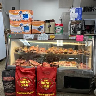 a display case with a variety of pastries