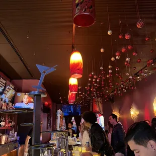 people sitting at the bar