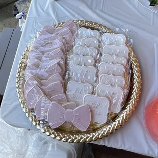 Blush pink "lil' miss" and bow sugar cookies