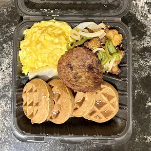 Waffle platter. I up charged to add peppers and onions to my home fries.
