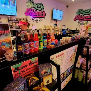 shelves of candy, ice cream, and other treats