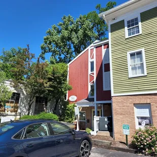 a car parked in front of a building