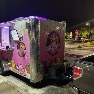 a pink ice cream truck