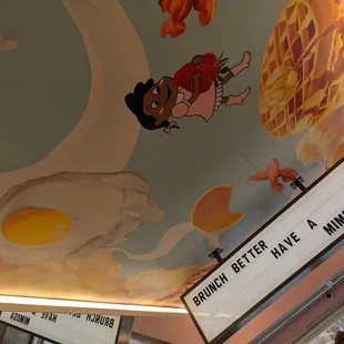 Even the ceiling was painted with an adorable mural!