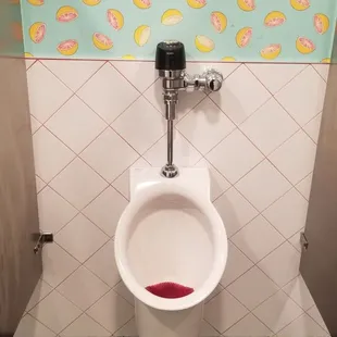  urinal in a bathroom