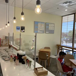 a woman sitting at a counter