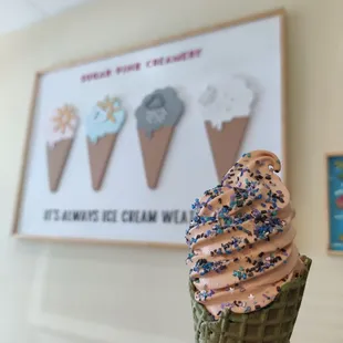 Thai tea soft serve with galaxy topping in matcha cone