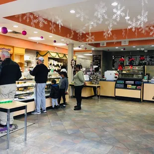 Make sure you grab a number. Then they will call your number to help you