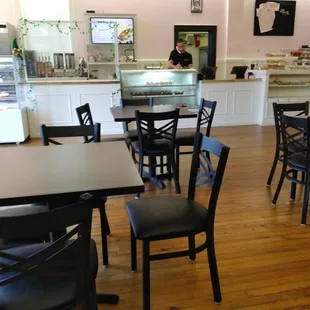 a restaurant with tables and chairs