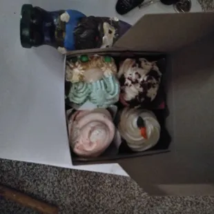a box of cupcakes on a table