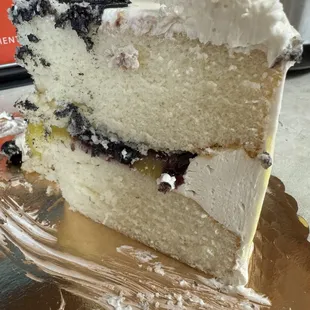 Slice of the lemon blueberry vanilla cake, moist and delicious!