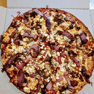 Build your own - onions, red pepper, goat cheese, extra sauce. YUMMMM