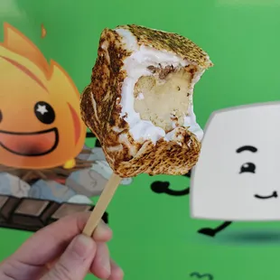 Cranberry Dream Bar Frozen S'more--maple oat ice cream rolled in white chocolate graham bark stuffed in a tart and creamy cranberry mallow!