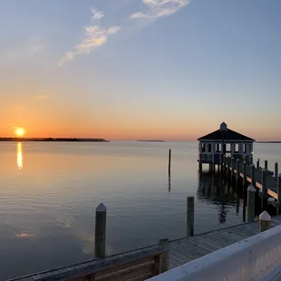 a sunset over the water