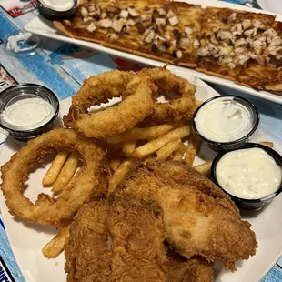 a plate of fried fish and onion rings