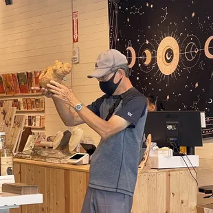 Yes, he's REALLY EXAMINING it!