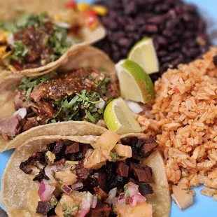 3 taco plate (carnitas, veggies, al pastor) with rice and beans