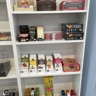 a shelf full of sweets