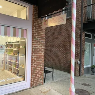 a pink and white striped pole