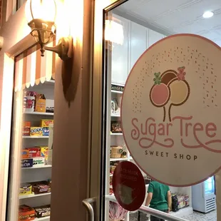 a sign for sugar tree sweet shop