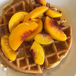 Belgium waffle with warm peaches