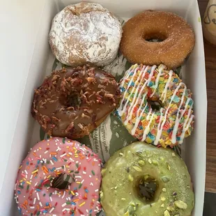 Powered filled lemon, Cinnamon &amp; Sugar, Maple Bacon, Fruity Pebbles, Strawberry Sprinkle, Pistachio Matcha.