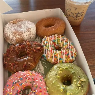 Powered filled lemon, Cinnamon &amp; Sugar, Maple Bacon, Fruity Pebbles, Strawberry Sprinkle, Pistachio Matcha, &amp; Iced Vanilla Latte!