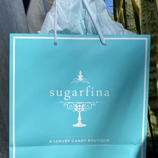 a blue shopping bag