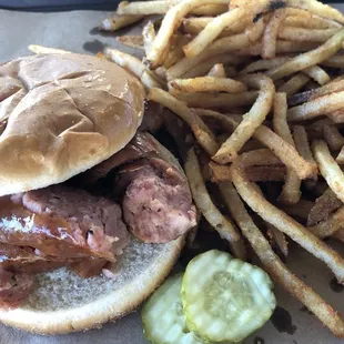 Sausage sandwich and fresh cut fries