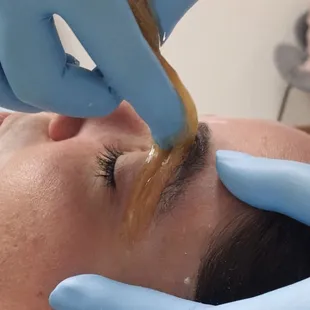 Eyebrow sugaring