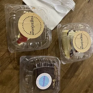 a variety of desserts in plastic containers
