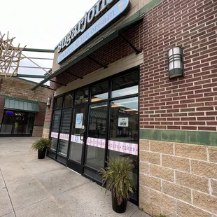 the entrance to a restaurant