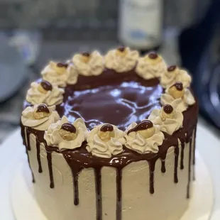 Chocolate Raisin Hazelnut Cake with Homemade Nutella glaze and whipped Frosting.
No Sugar added.
Organic Ingredients.