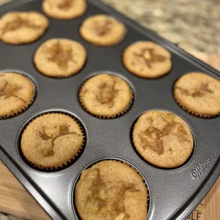 a muffin pan filled with muffins